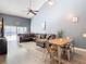 Spacious living room with vaulted ceilings and L-shaped sofa at 925 Wintergreen Blvd, Fern Park, FL 32730