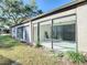 Spacious sunroom with sliding glass doors, offering abundant natural light at 925 Wintergreen Blvd, Fern Park, FL 32730