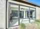 Bright sunroom with sliding glass doors and tile floor at 925 Wintergreen Blvd, Fern Park, FL 32730