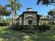 Community clubhouse with landscaping at 9714 Nonacrest Dr, Orlando, FL 32832