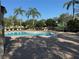 Community pool with lounge chairs at 9714 Nonacrest Dr, Orlando, FL 32832