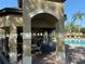 Covered patio area by the pool at 9714 Nonacrest Dr, Orlando, FL 32832