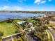 Scenic aerial view of the community pool, clubhouse, and lakefront homes at 1101 Maidenmoor Rd, Winter Garden, FL 34787