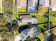 Aerial view of a neighborhood featuring homes with private pools and green lawns at 1101 Maidenmoor Rd, Winter Garden, FL 34787