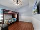 room with bunkbeds, ceiling fan and wall-mounted television at 1101 Maidenmoor Rd, Winter Garden, FL 34787