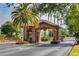 Stone pillars and manicured landscaping welcomes you to Stoneybrook West at 1101 Maidenmoor Rd, Winter Garden, FL 34787