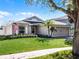 Charming single-story home with lush lawn, complemented by well-kept landscaping and a two-car garage at 1101 Maidenmoor Rd, Winter Garden, FL 34787