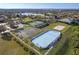 Aerial view of the tennis court, sand volleyball, ice rink, and basketball courts at 1101 Maidenmoor Rd, Winter Garden, FL 34787