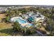 Community pool and clubhouse with solar panels at 114 Rum Run, Davenport, FL 33837
