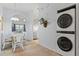 Laundry closet with stackable washer and dryer in a condo unit at 114 Rum Run, Davenport, FL 33837