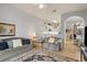 Open concept living room, view of kitchen and dining area at 114 Rum Run, Davenport, FL 33837