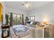 Spacious living room with comfy sofas and access to balcony at 114 Rum Run, Davenport, FL 33837