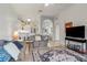 Open living space with a view into kitchen and dining area at 114 Rum Run, Davenport, FL 33837
