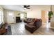 Bright living room with large windows and comfortable sectional sofa at 1232 Saint James Rd, Orlando, FL 32808