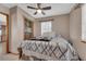 Cozy bedroom with a comfortable bed, soft lighting, and a relaxed atmosphere at 15040 Ne 248Th Avenue Rd, Fort Mc Coy, FL 32134
