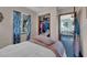 Bedroom featuring closet, window view, and easy access to other areas of the home at 15040 Ne 248Th Avenue Rd, Fort Mc Coy, FL 32134