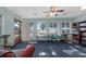 Bright and airy common area with multiple workspaces and water views at 15040 Ne 248Th Avenue Rd, Fort Mc Coy, FL 32134