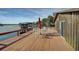 Spacious deck with outdoor seating, perfect for enjoying waterfront views and outdoor dining experiences at 15040 Ne 248Th Avenue Rd, Fort Mc Coy, FL 32134