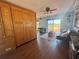 Bright and airy living room showcasing wood floors, a comfortable seating area, and waterfront views from the deck at 15040 Ne 248Th Avenue Rd, Fort Mc Coy, FL 32134