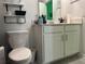 Clean bathroom with toilet, vanity, and shower/tub at 1563 Cross Prairie Pkwy, Kissimmee, FL 34744