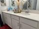 Double vanity bathroom with quartz countertop at 1563 Cross Prairie Pkwy, Kissimmee, FL 34744