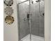 Clean shower with gray tile surround at 1563 Cross Prairie Pkwy, Kissimmee, FL 34744