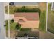 Top-down view of a one-story house with brown roof and yard at 16067 Shasta St, Clermont, FL 34714