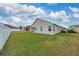 Large backyard with grassy area and fence at 16067 Shasta St, Clermont, FL 34714