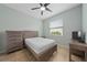 Bedroom with a bed, dresser, and window at 16067 Shasta St, Clermont, FL 34714