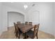 Bright dining area with a wooden table and six chairs at 16067 Shasta St, Clermont, FL 34714