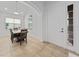 Open dining area with a view of the entryway at 16067 Shasta St, Clermont, FL 34714