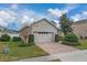 One story house with a two-car garage and manicured lawn at 16067 Shasta St, Clermont, FL 34714