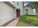 Inviting front entrance with a brick pathway and well-maintained landscaping at 16067 Shasta St, Clermont, FL 34714