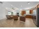 Open kitchen with stainless steel appliances and an island at 16067 Shasta St, Clermont, FL 34714