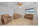 Relaxing living room with recessed lighting and sliding glass doors at 16067 Shasta St, Clermont, FL 34714
