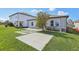 Spacious backyard with concrete patio is perfect for entertaining or relaxing outdoors at 1609 Hill Park Dr, Deltona, FL 32725