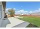 A spacious backyard featuring a concrete patio and lush lawn, ideal for outdoor enjoyment at 1609 Hill Park Dr, Deltona, FL 32725