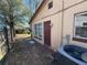 Exterior shot showing a partial view of the backyard with a privacy fence and the exterior of the home at 2101 La Due Ct, Orlando, FL 32811