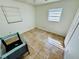 Bedroom showing windows, tiled floors, and a closet at 2101 La Due Ct, Orlando, FL 32811