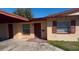 Updated exterior of a charming single-story home with a well-maintained lawn at 2101 La Due Ct, Orlando, FL 32811