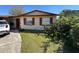 Charming one-story home with mature landscaping, natural light and neutral color palette at 2101 La Due Ct, Orlando, FL 32811