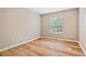 Well-lit room with wood floors, neutral paint and natural light at 231 Chestnut Ridge St, Winter Springs, FL 32708