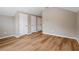 Bright bedroom featuring light wood floors and neutral paint at 231 Chestnut Ridge St, Winter Springs, FL 32708