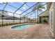 Screened pool with brick pavers, with great privacy and beautiful natural light at 231 Chestnut Ridge St, Winter Springs, FL 32708