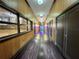Well-lit hallway leading to the gymnasium, enhancing building accessibility at 2328 Midtown Ter # 1024, Orlando, FL 32839
