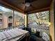 Relaxing screened patio for outdoor dining and enjoying the surrounding views of the community at 2328 Midtown Ter # 1024, Orlando, FL 32839