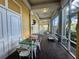Covered patio offering ample seating and views, with a mix of brick flooring at 2328 Midtown Ter # 1024, Orlando, FL 32839