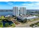 Expansive aerial displaying towers, a waterway feature, and ample parking near a city street at 241 Riverside Dr # 201, Daytona Beach, FL 32117