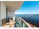 Relaxing balcony featuring comfortable seating and panoramic views of the water and the city skyline at 241 Riverside Dr # 201, Daytona Beach, FL 32117