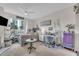 Bright bedroom with city views, a comfortable bed, and functional study space at 241 Riverside Dr # 201, Daytona Beach, FL 32117